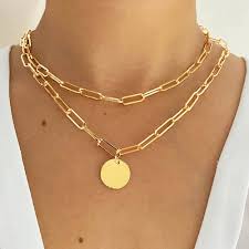 Collier Sautoir Doré avec Pendentif Trombone - Élégance et Style