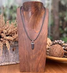 Pendentif Dénergie Naturelle Volcanique Inoxydable - Élégance et Force